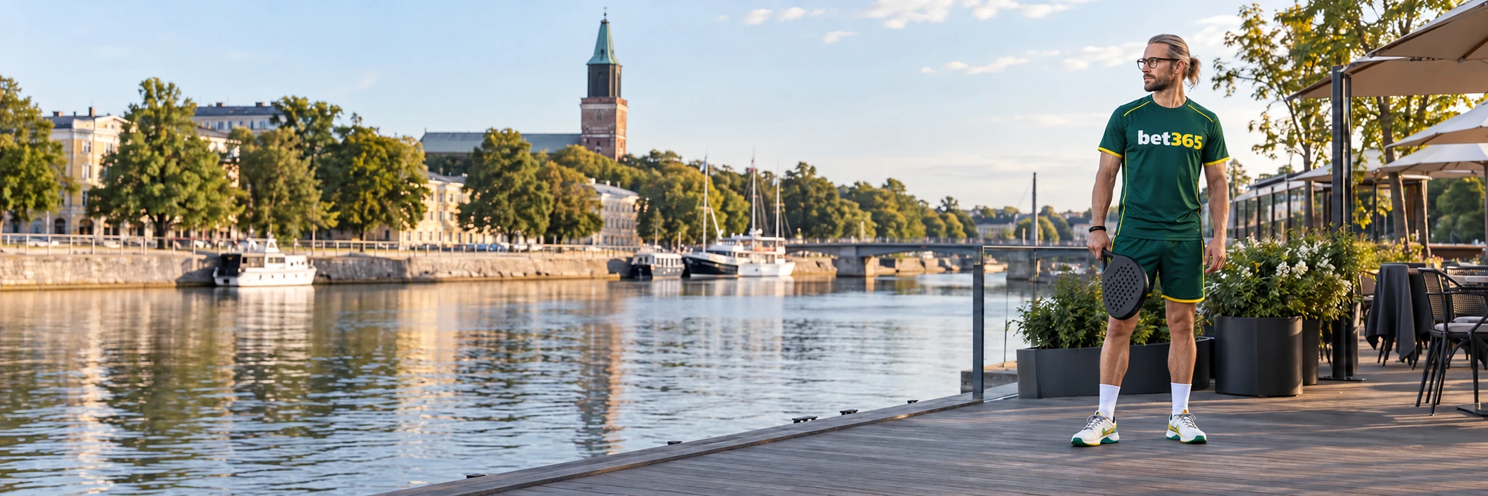 Badminton player beside the Turku waterfront wearing bet365 branding